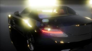 luxury sport car in dark studio with bright lights video