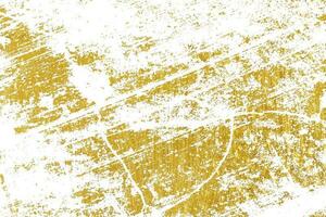 Gold splashes Texture. Brush stroke design element. Grunge golden background pattern of cracks, scuffs, chips, stains, ink spots, lines photo