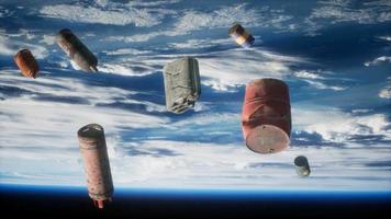 Space debris, pollution of the atmosphere of the planet Earth and space by human waste. Elements furnished by NASA video