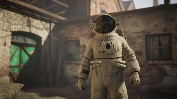 Lost Astronaut near Abandoned Industrial Buildings of Old Factory video