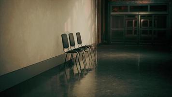 empty corridor in hospital with chairs