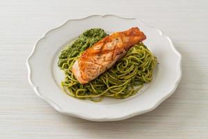 Spaghetti pesto with grilled salmon photo