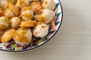 Meatball and fishball spicy salad photo