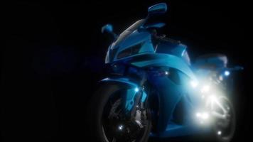 moto sport bike in dark studio with bright lights video