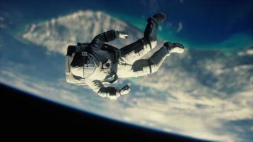 dead astronaut leaving Earth orbit Elements of this image furnished by NASA video