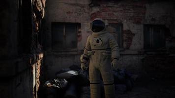 Lost Astronaut near Abandoned Industrial Buildings of Old Factory video