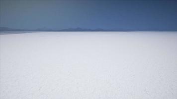 Bonneville Salt Flats landscape with rain storm clouds in distance video