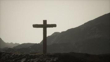 wooden Crucifix cross at mountain video