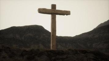 wooden Crucifix cross at mountain video