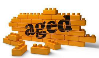 aged word on yellow brick wall photo