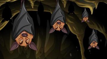 Cave scene with group of bats in cartoon style vector