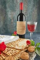 Pesach celebration concept - jewish Passover holiday. Matzah on traditional Seder plate photo