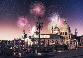 Venice. Photo greeting card. Colorful fireworks on the black sky background.