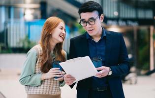 Portrait of young Asian business people at office photo