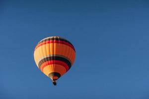 A group of colorful hot air balloons against photo