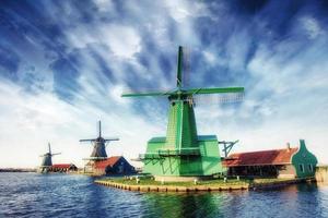 Traditional Dutch windmills from the channel Rotterdam. Holland photo