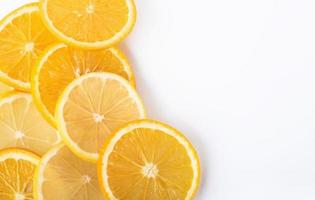 slices of orange and lemon isolated on a white background photo