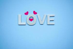 love word on the blue background for valentine's day photo