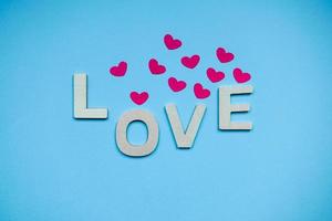 love word on the blue background for valentine's day photo