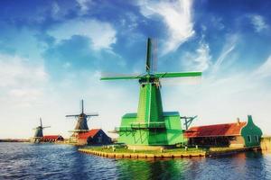 Traditional Dutch windmills from the channel Rotterdam. Holland photo