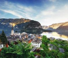 View from height on Hallstatt town between the mountains. photo