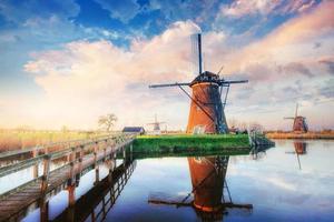 Traditional Dutch windmills from the channel Rotterdam. Holland photo