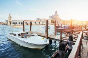 Gondolas on Grand canal in Venice, San Giorgio Maggiore church. San Marco. photo