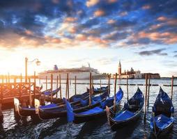 Gondolas on Grand canal in Venice, San Giorgio Maggiore church. San Marco. Beautiful summer landscape. photo