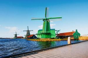 Traditional Dutch windmills from the channel Rotterdam. photo