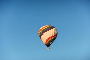 A group of colorful hot air balloons against photo