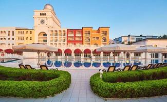 Swimming pool and beach of luxury hotel. Type entertainment complex. Amara Dolce Vita Luxury Hotel. Resort. Tekirova-Kemer