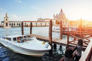 Gondolas on Grand canal in Venice, San Giorgio Maggiore church. San Marco. photo