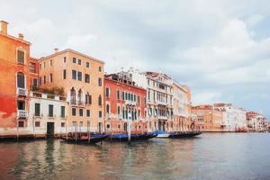 Venice Grand canal with gondolas and Rialto Bridge, Italy in summer bright day photo