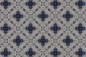 grey abstract textured background, symmetric lines and shapes photo