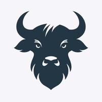 Vector silhouette of buffalo heads in a minimalist style