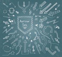 Hand drawn arrow icons set on blue chalk board. vector