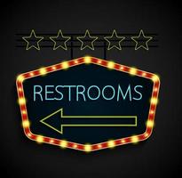 Shining retro light banner restrooms on a black background vector