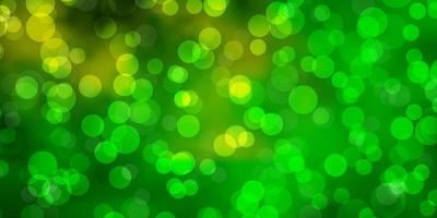 Light Green, Yellow vector backdrop with dots.