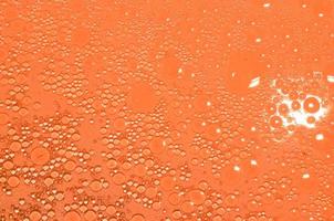 oil in orange water photo