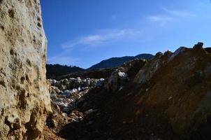 large quarry with blue sky photo