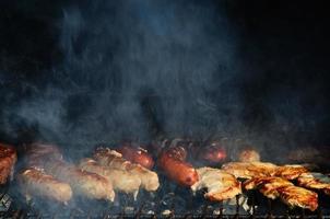 smoking meat on the grill photo