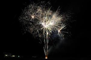 white fireworks in the night on a party photo