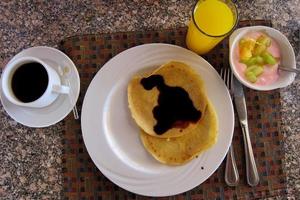 breakfast pancakes on a table photo