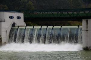 dam with rushing water photo