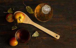 Vegetarian apple composition on rustic wooden background. photo