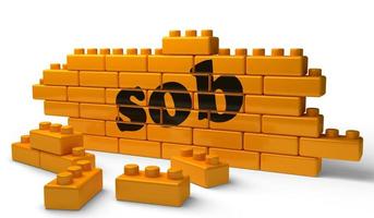 sob word on yellow brick wall photo