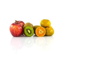 Apple, kiwi and orange isolate on white background photo