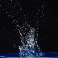 water splashes, isolated on a black background photo