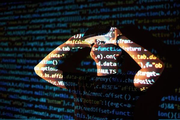 Double exposure of a caucasian man and Virtual reality headset is presumably a gamer or a hacker cracking the code into a secure network or server, with lines of code
