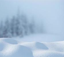 Winter background with a pile of snow and thick fog in the background. Copyspace for text. Happy New Year. Carpathian. Ukraine. photo